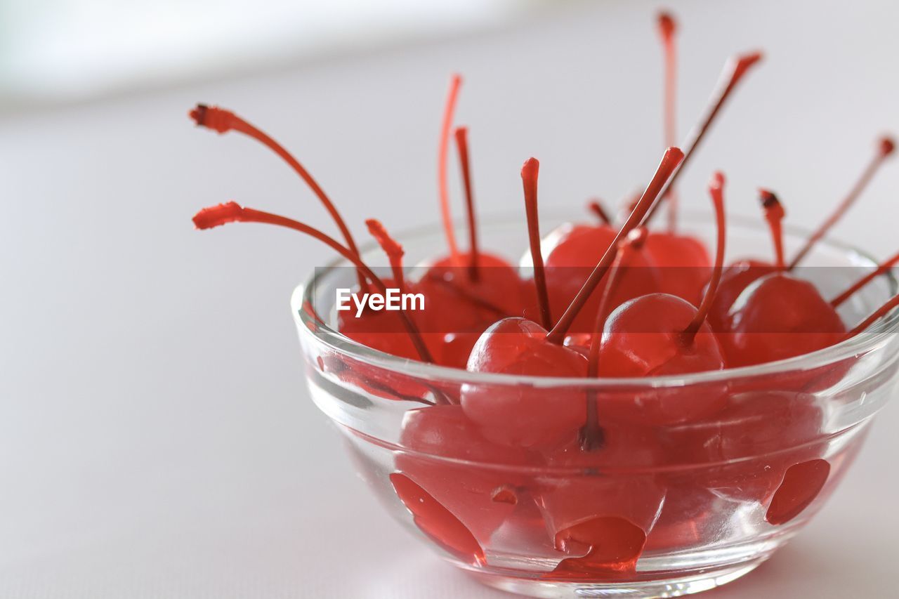 CLOSE-UP OF FRUITS IN GLASS BOWL