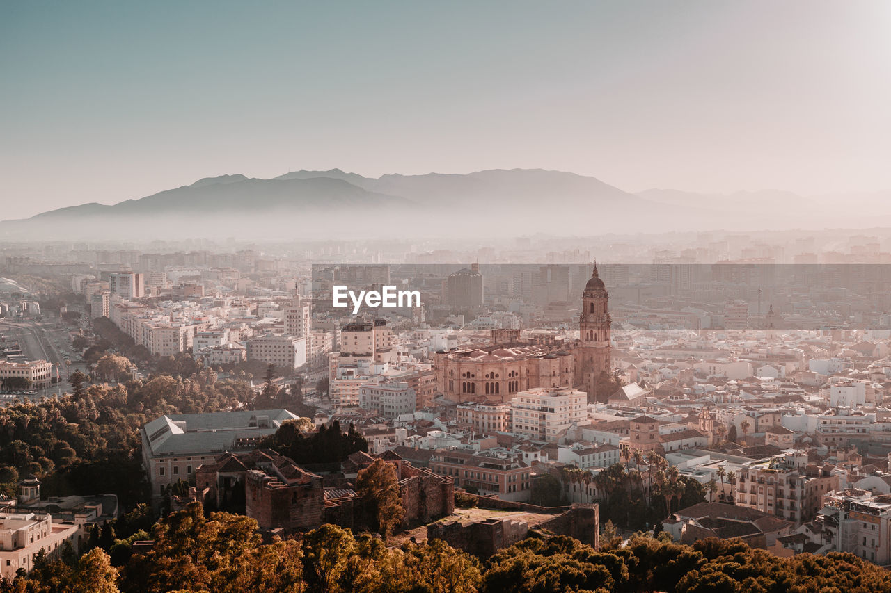 Aerial view of cityscape in foggy weather