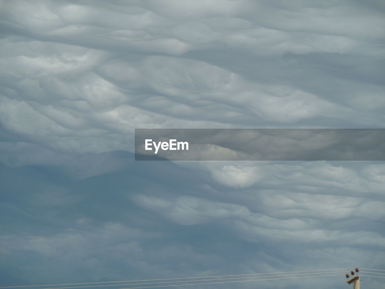 AERIAL VIEW OF CLOUDS AGAINST SKY