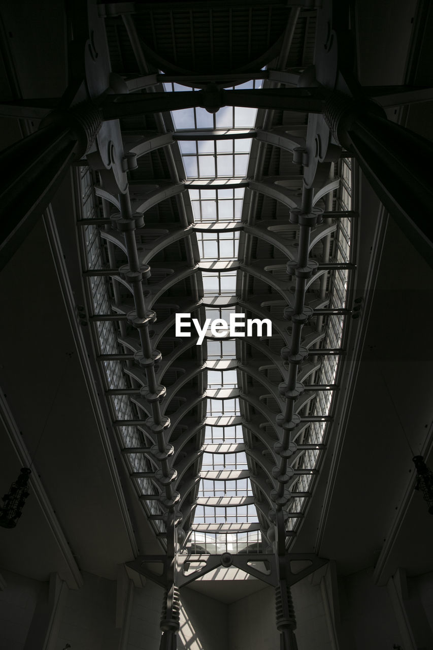 LOW ANGLE VIEW OF SKYLIGHT IN BUILDING