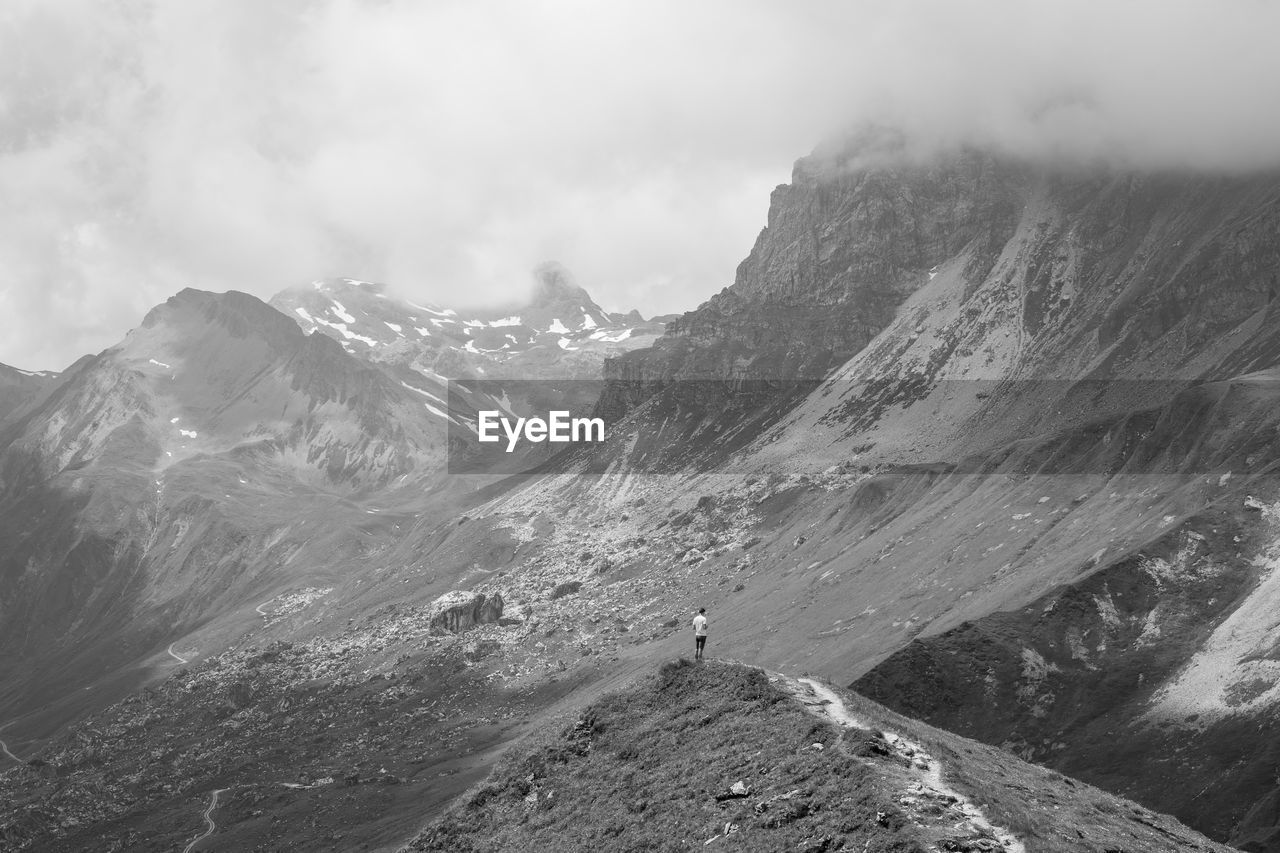 panoramic view of snowcapped mountains against sky