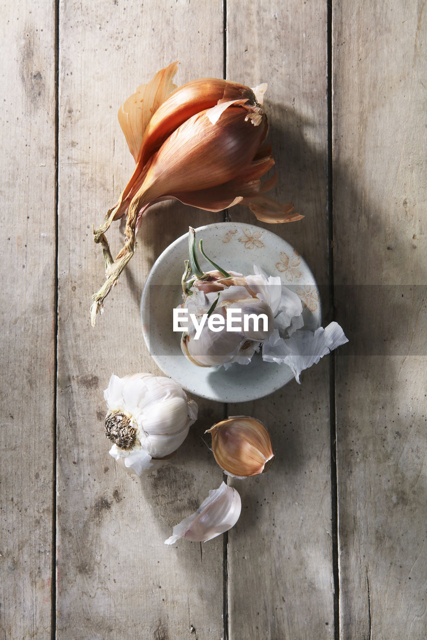 Garlic onions still life on wood table