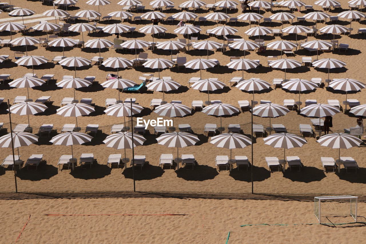 Rows of umbrellas on the beach