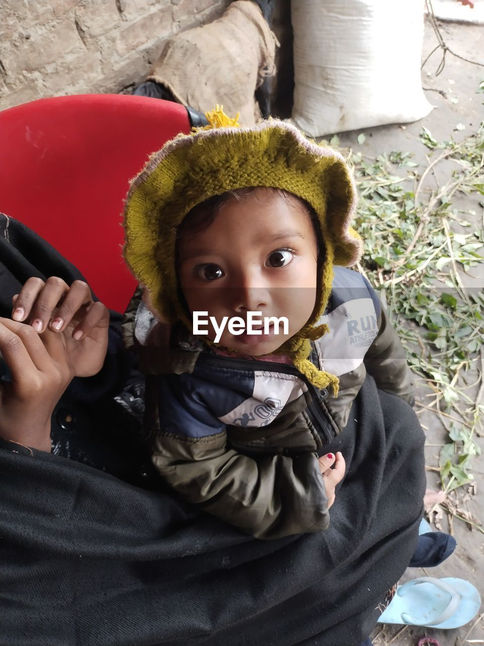 childhood, child, portrait, looking at camera, toddler, person, men, baby, cute, one person, clothing, innocence, hat, front view, day, emotion, human face, high angle view, lifestyles, female, leisure activity, outdoors, holding, nature, smiling