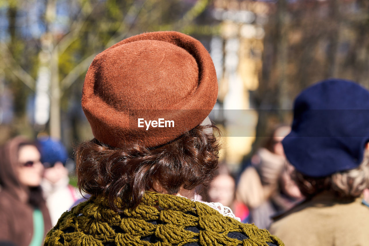 Rear view of woman wearing hat