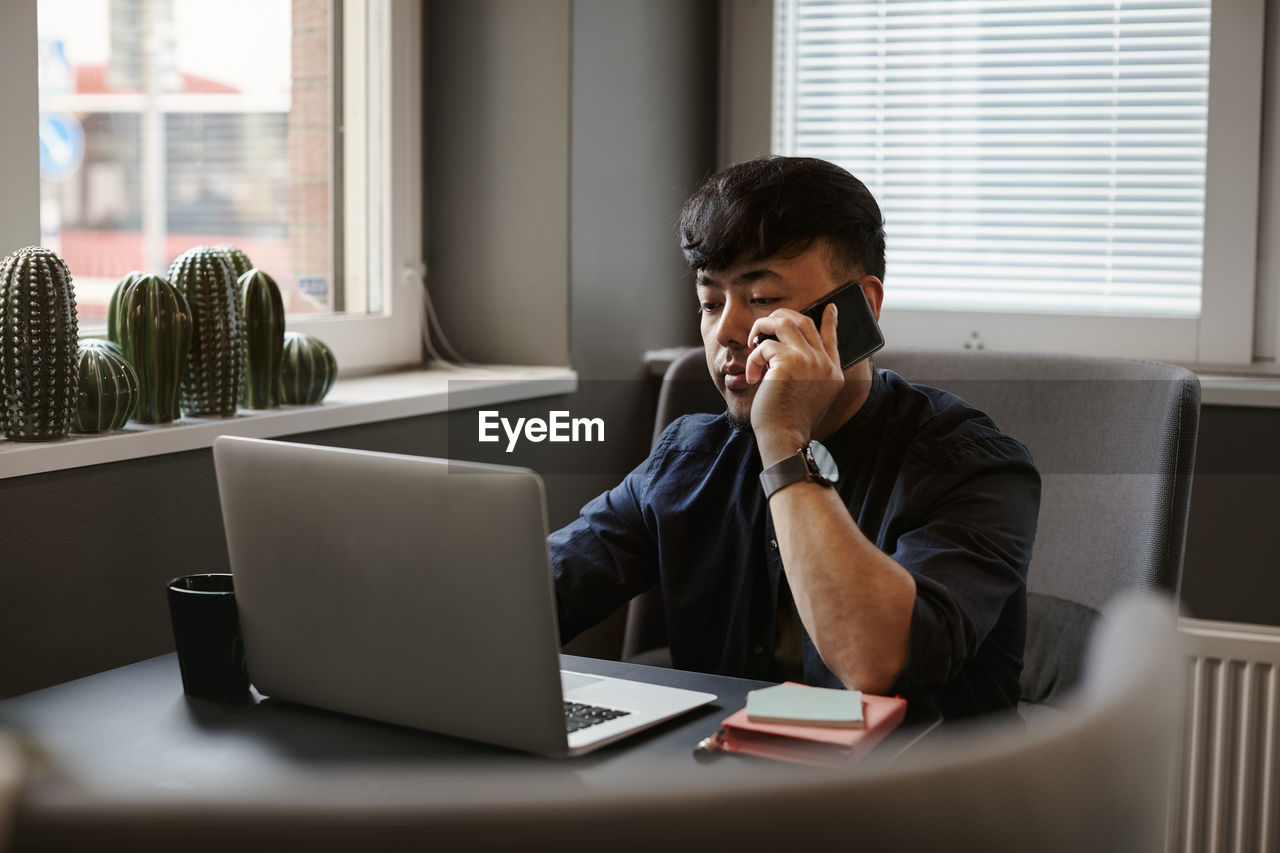 Man on the phone in office