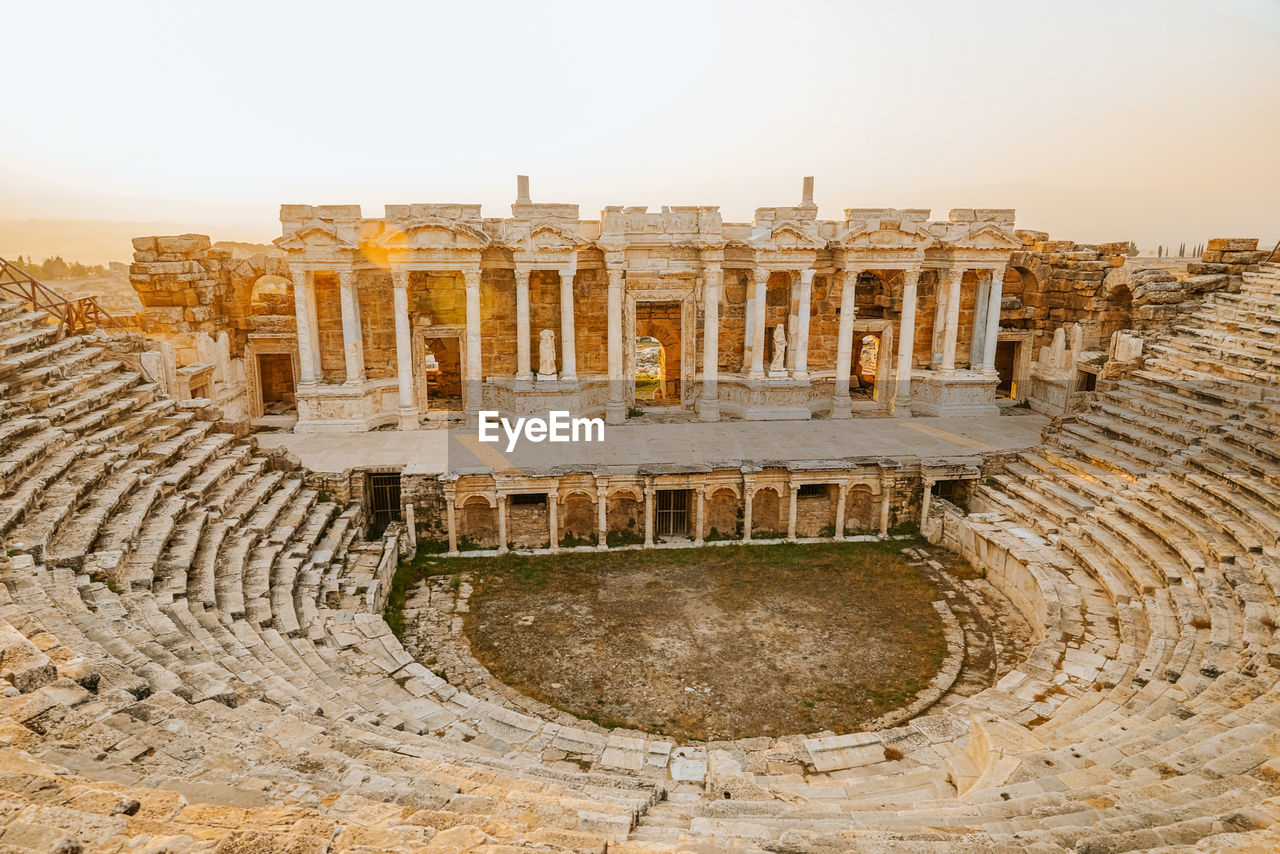 Roman amphitheater in the ruins of hierapolis, in pamukkale, turkey. unesco world heritage in turkey