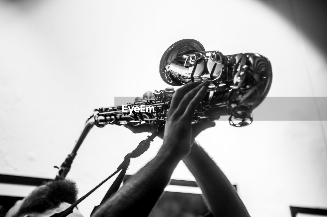 Close-up of man playing saxophone
