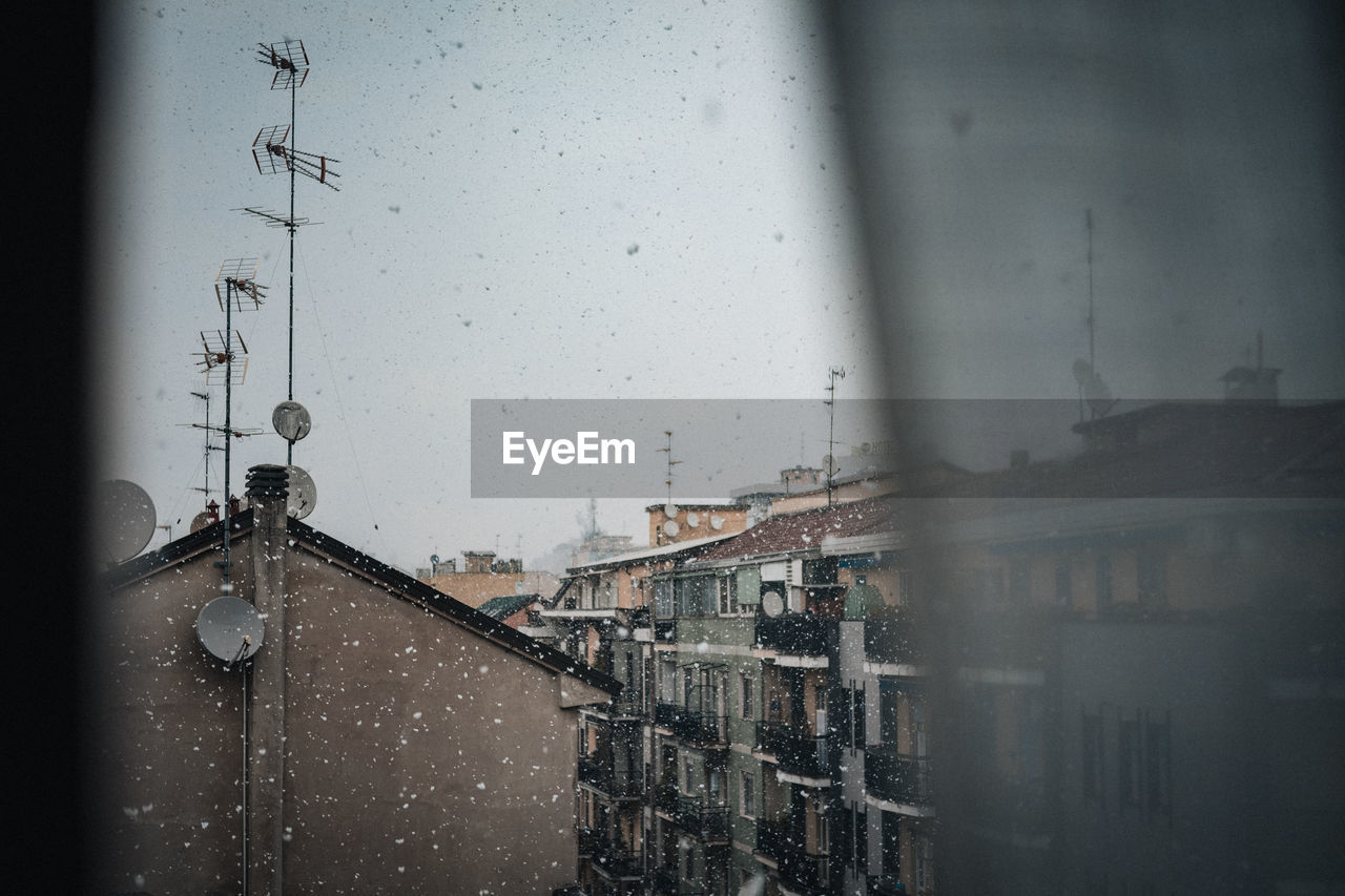 RAINDROPS ON GLASS WINDOW