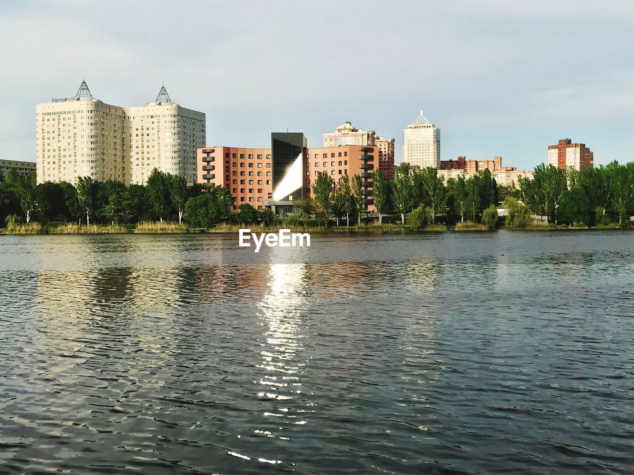 Buildings in city against sky