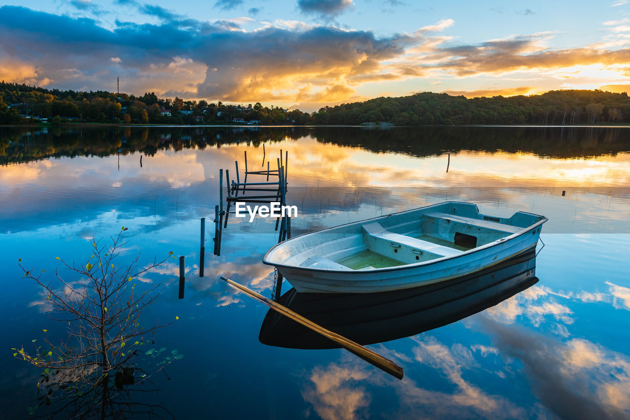 Boat moored in flooded lake