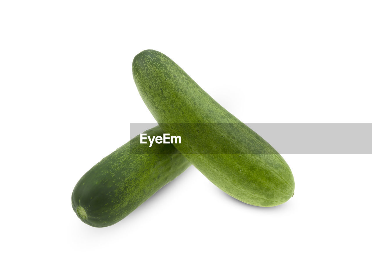 cucumber, food and drink, food, zucchini, green, healthy eating, cut out, wellbeing, vegetable, freshness, studio shot, white background, produce, plant, indoors, no people, gherkin, raw food, summer squash, fruit, organic, close-up, copy space, still life