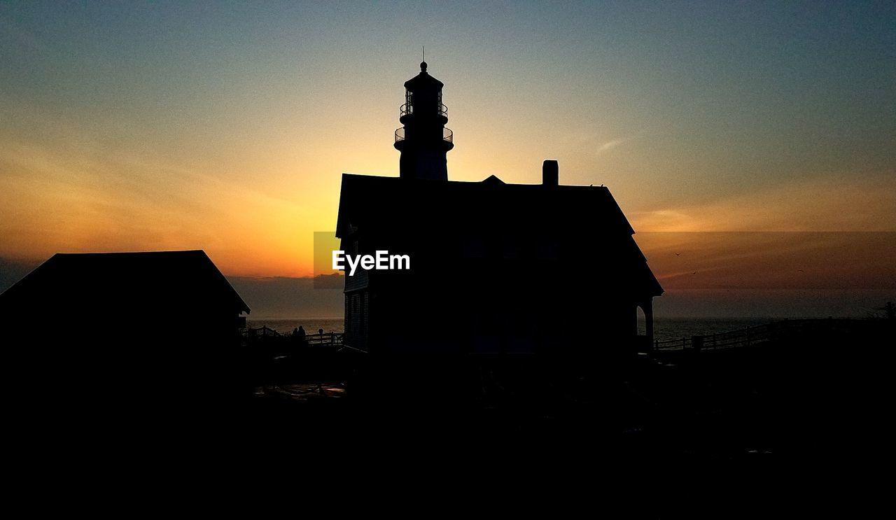 SILHOUETTE OF BUILDINGS DURING SUNSET