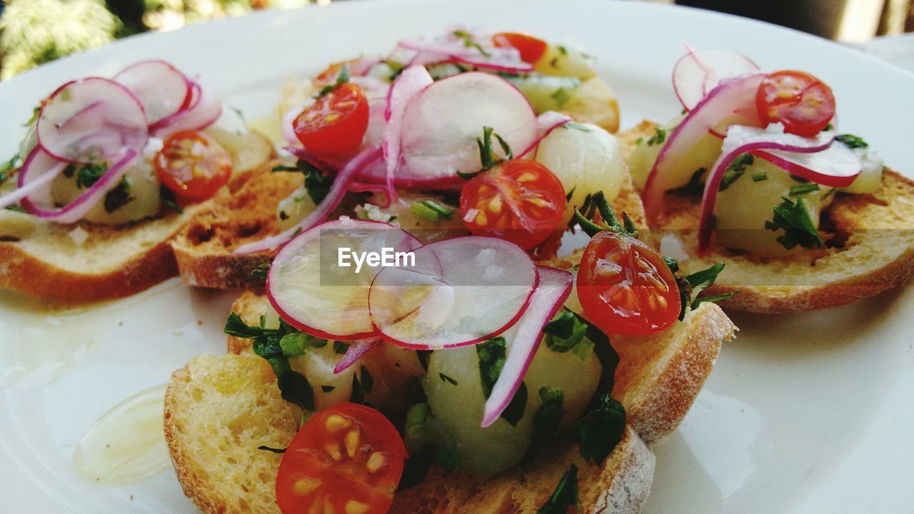 Close-up of bruschetta bread with toppings