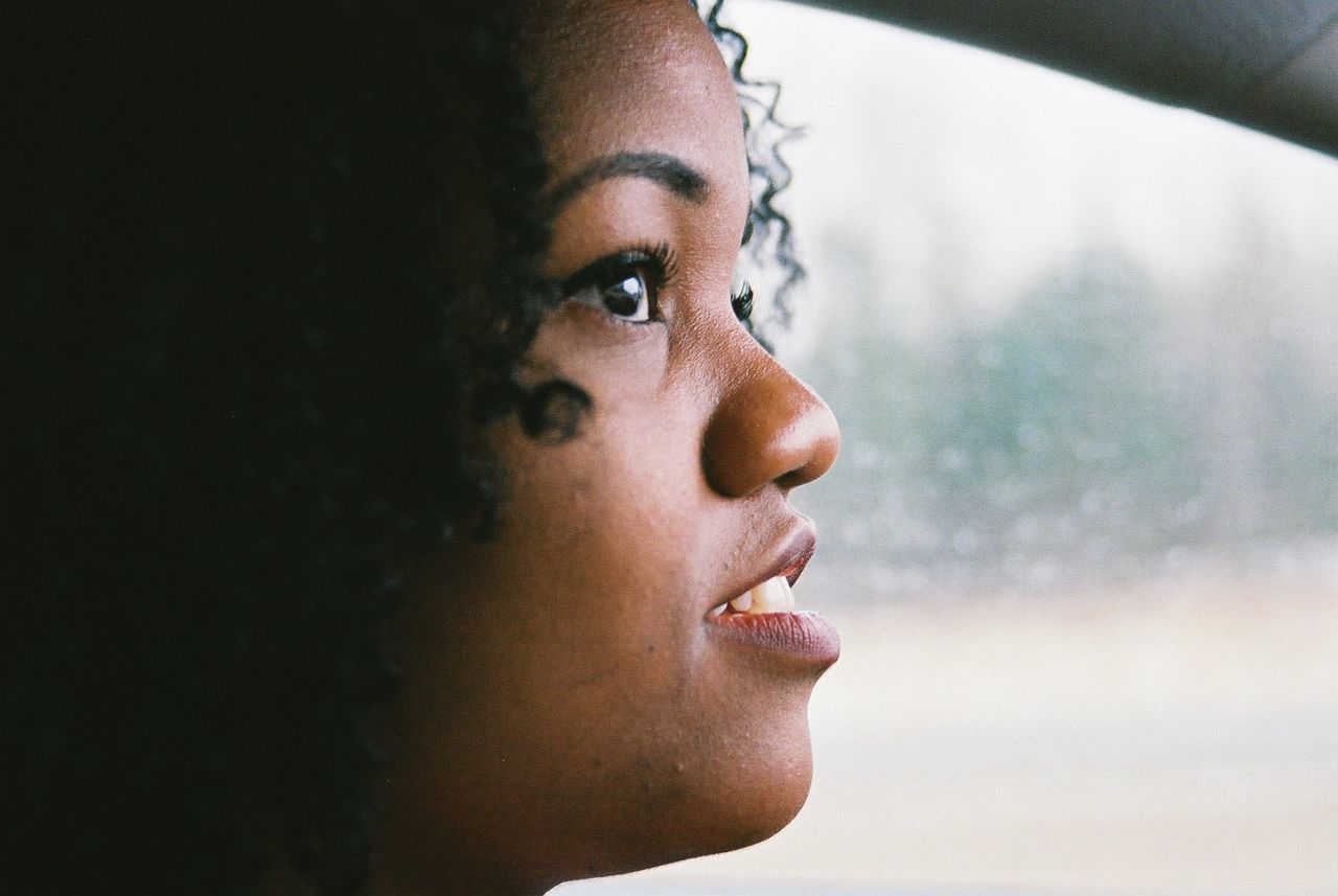 Close-up of woman in car