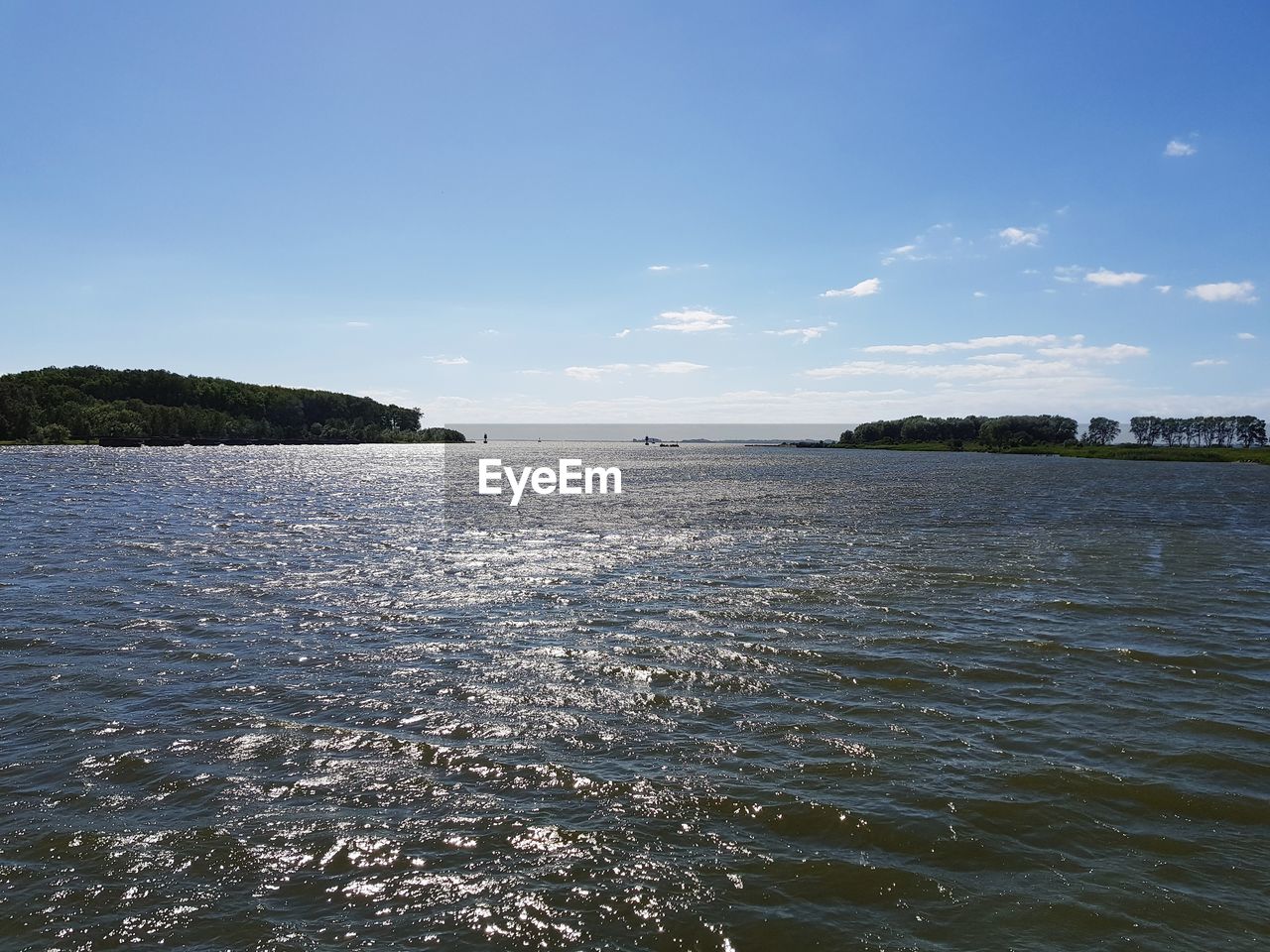 SCENIC VIEW OF SEA AGAINST BLUE SKY