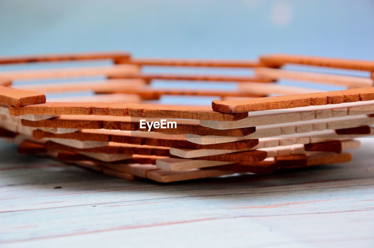 STACK OF FIREWOOD ON TABLE