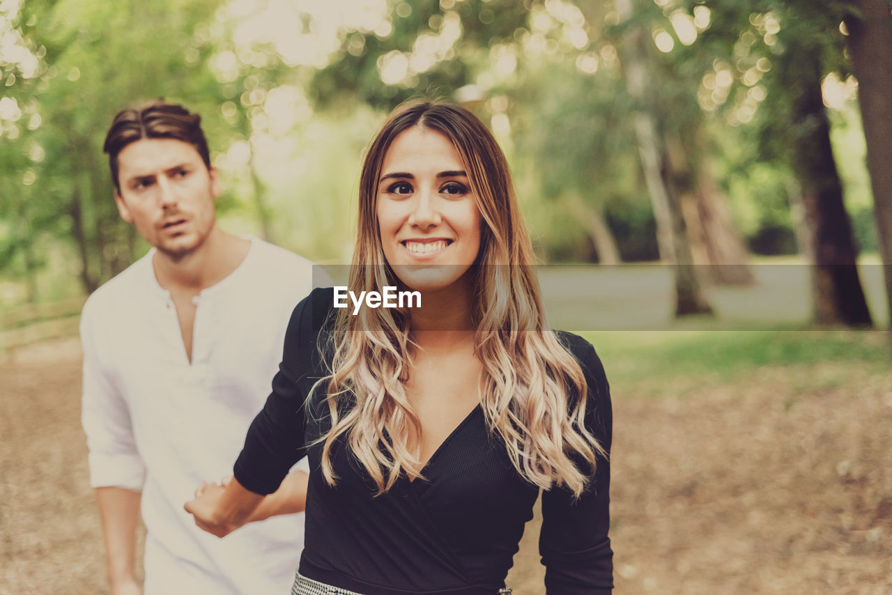 Couple standing at park