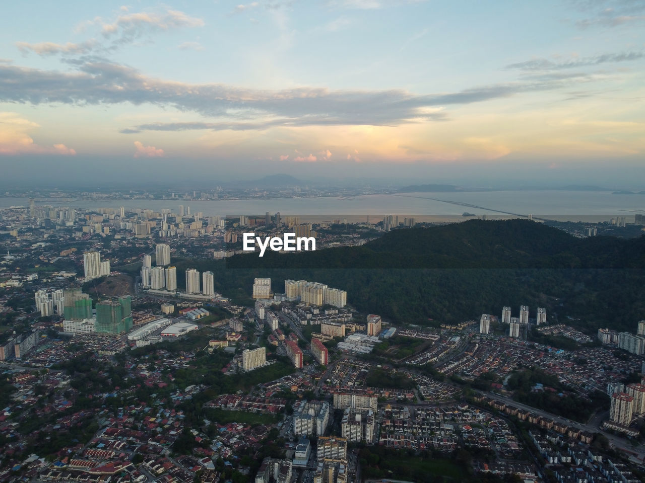 aerial view of townscape against sky during sunset