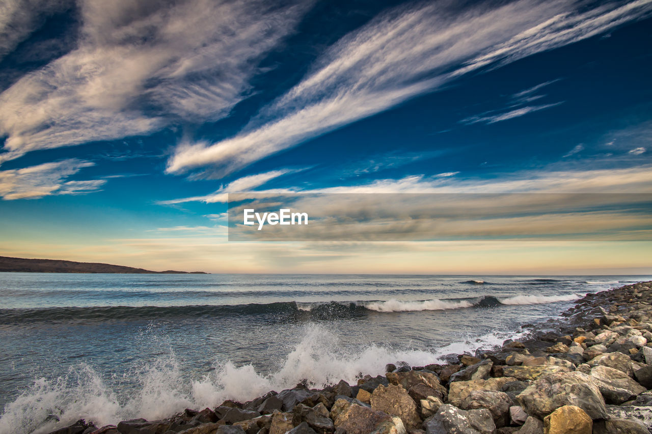 Scenic view of sea against sky during sunset