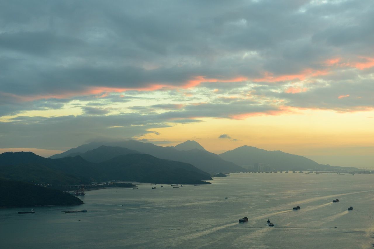 Scenic view of dramatic sky over sea during sunset