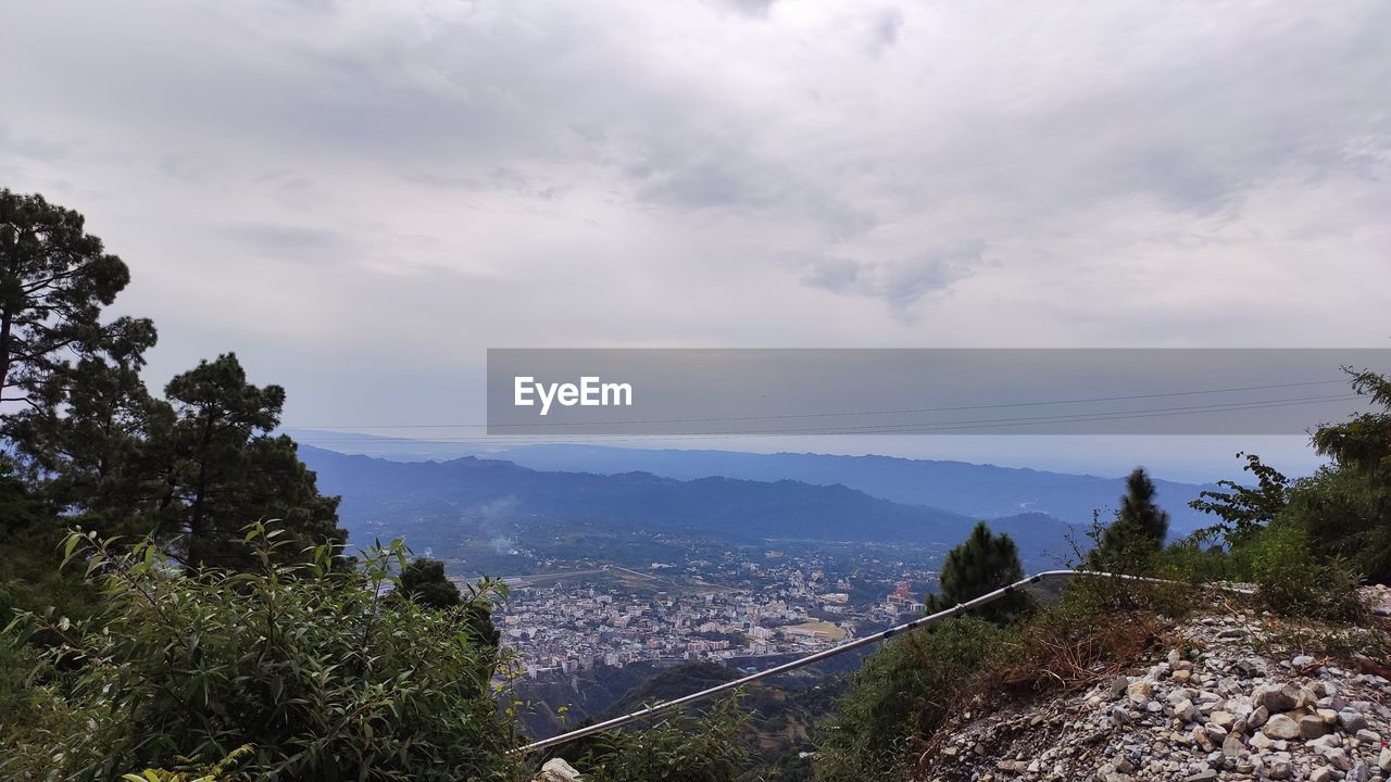 SCENIC VIEW OF MOUNTAIN AGAINST SKY