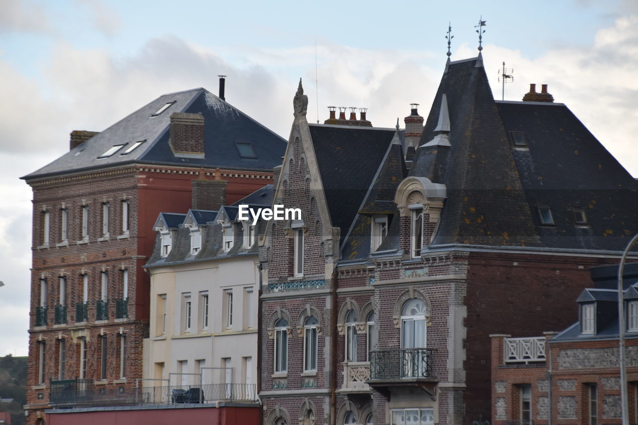 Low angle view of buildings against sky