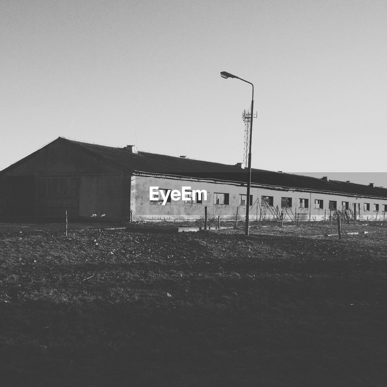 Abandoned buildings against clear sky