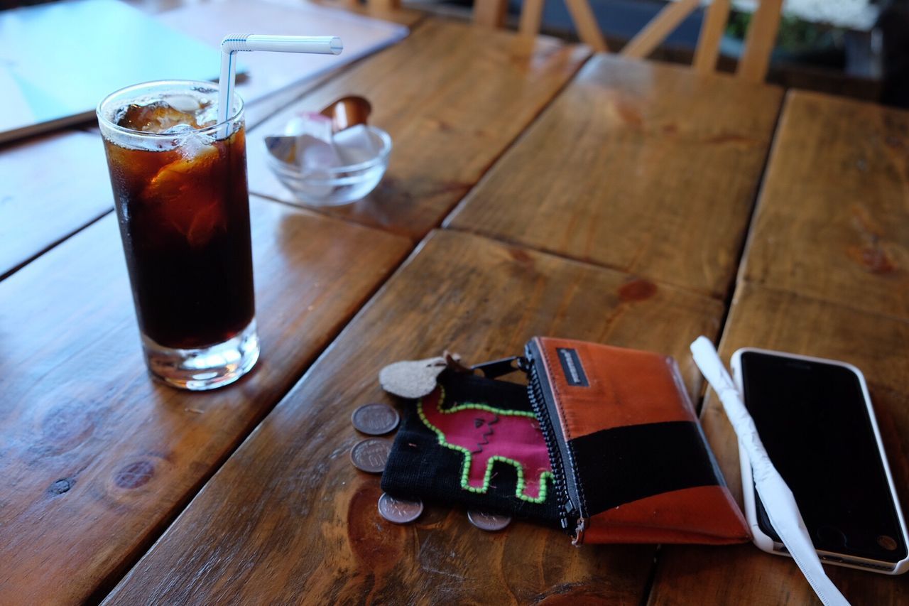 CLOSE-UP OF BEER ON TABLE