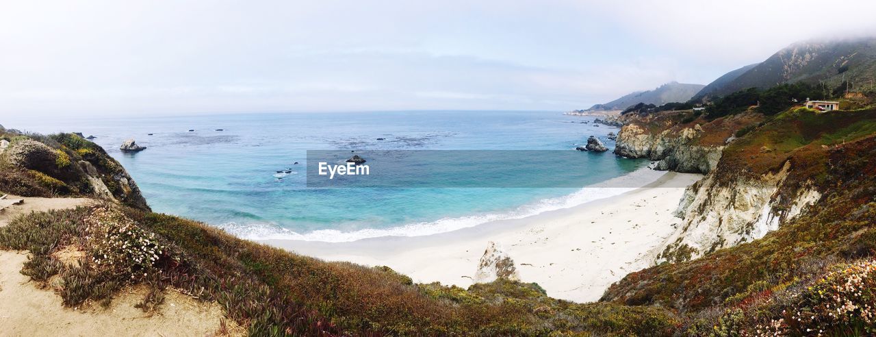 Panoramic view of beach against sky