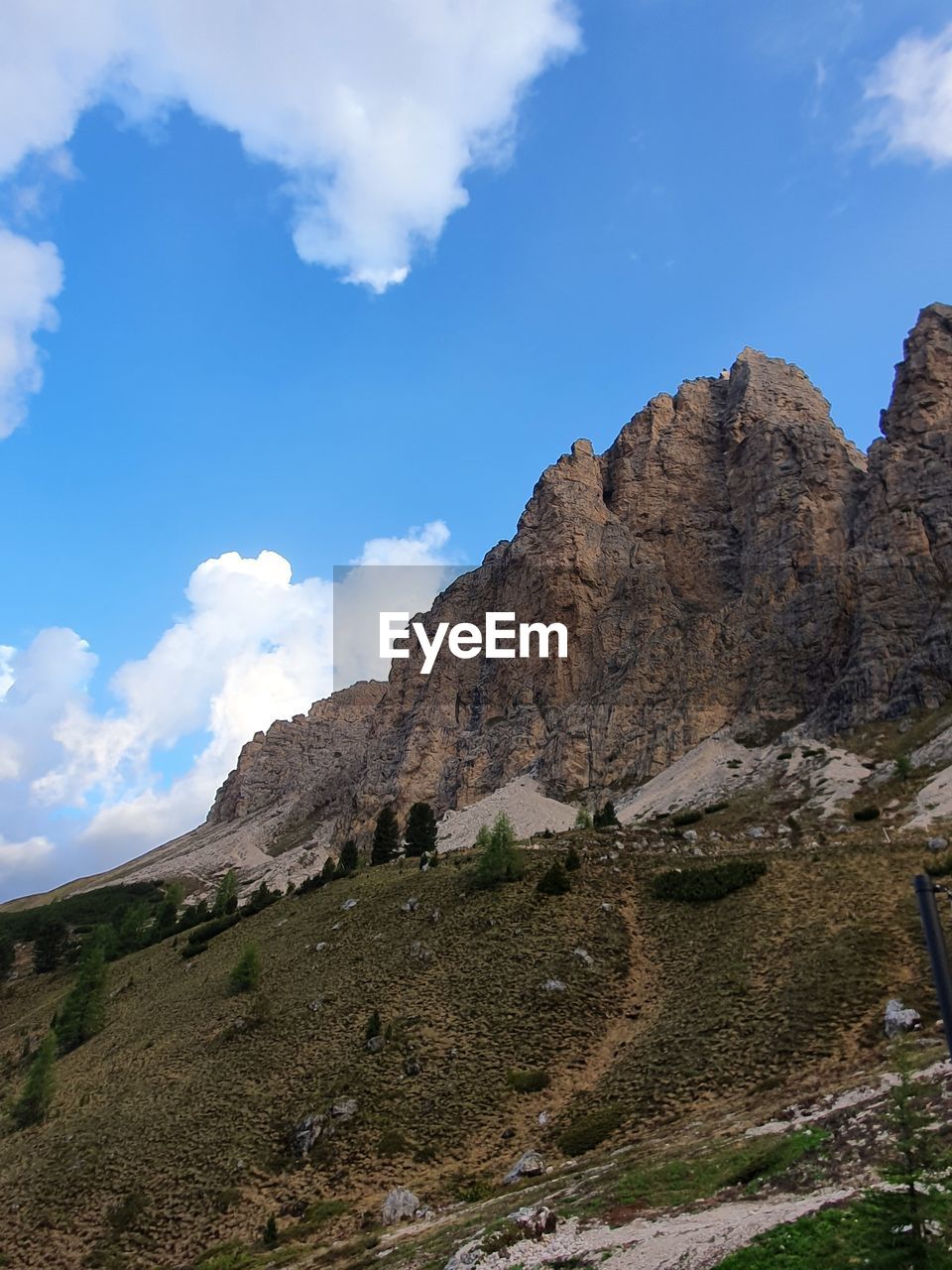 LOW ANGLE VIEW OF ROCK FORMATION AGAINST SKY