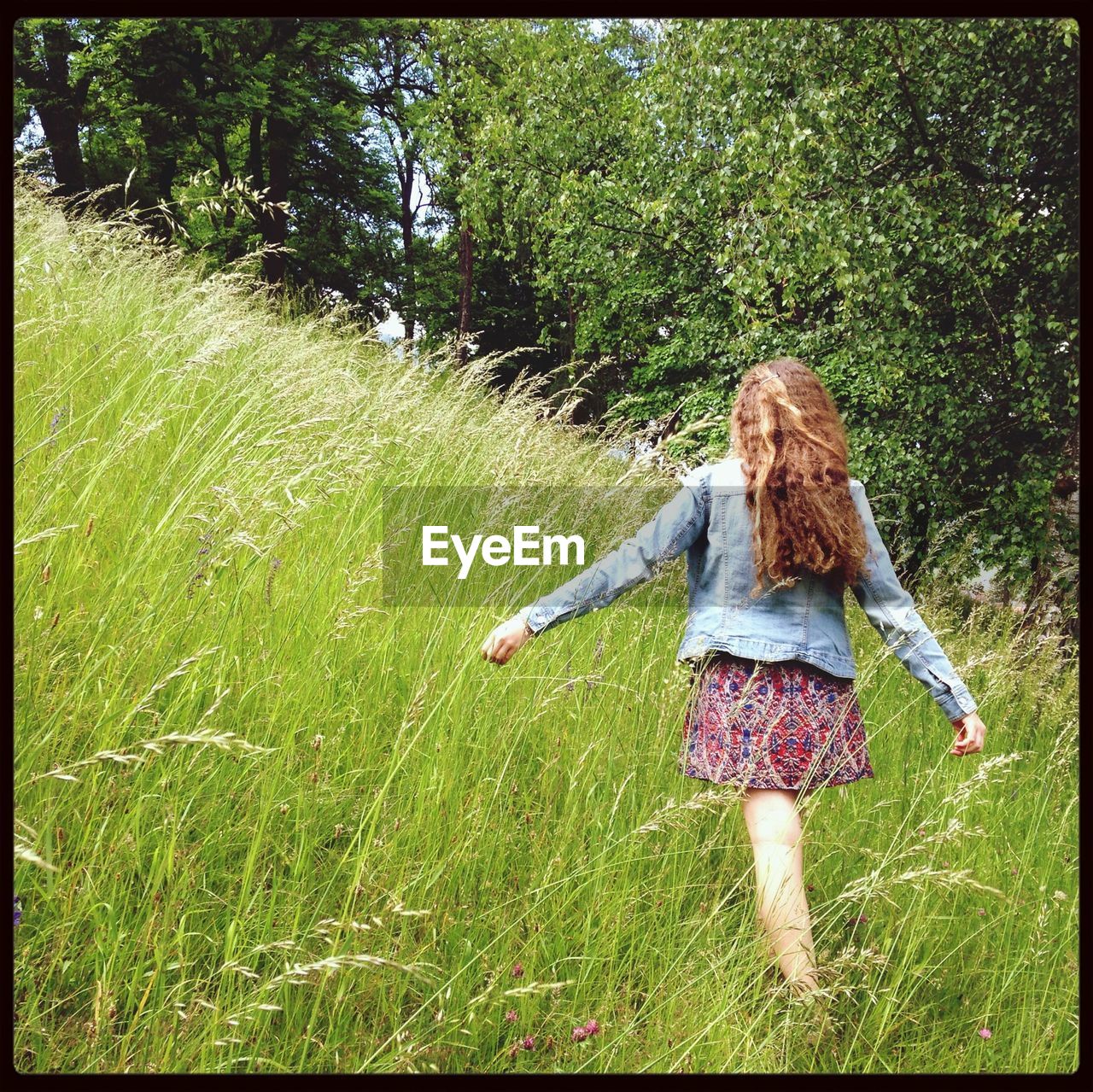 Woman walking in a forest