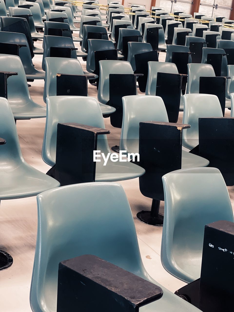 Full frame shot of empty chairs in stadium
