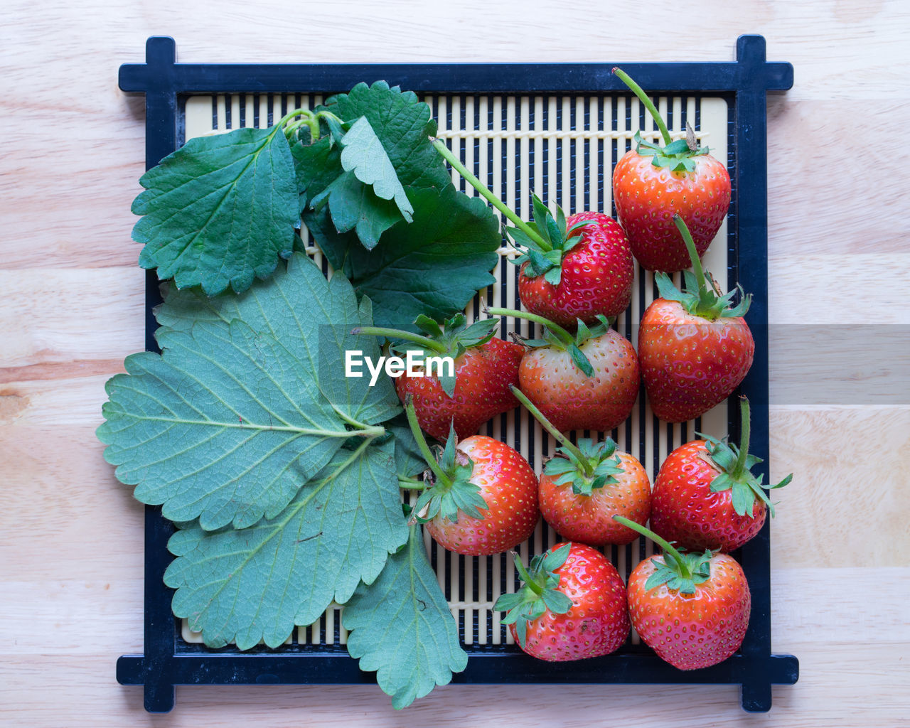 CLOSE-UP OF FRUITS ON TABLE