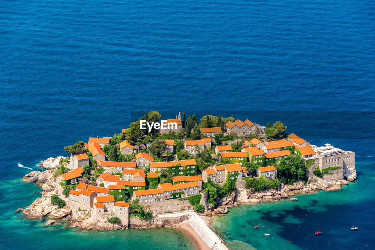 High angle view of town by sea