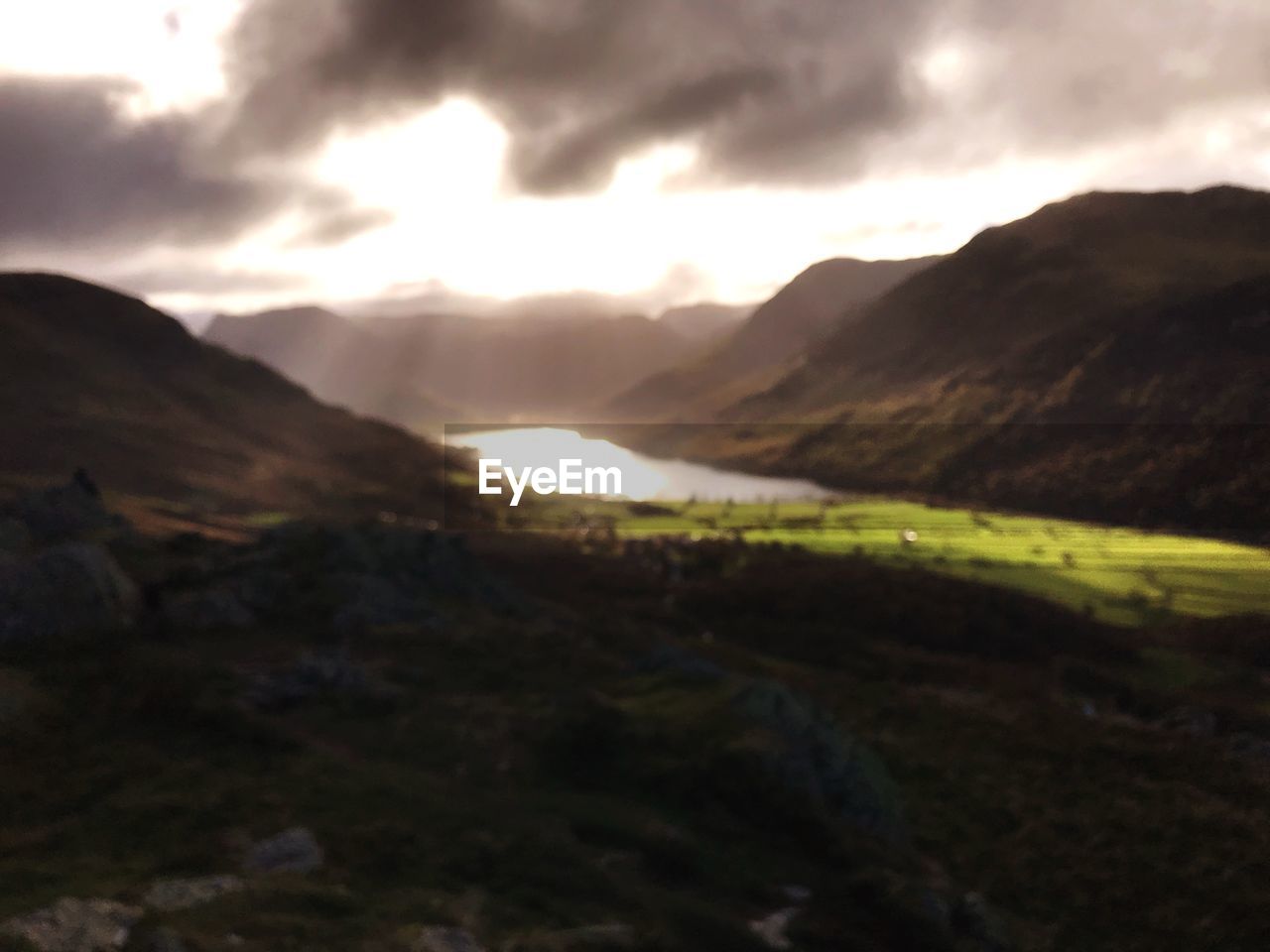 SCENIC VIEW OF LANDSCAPE AND MOUNTAINS AGAINST SKY