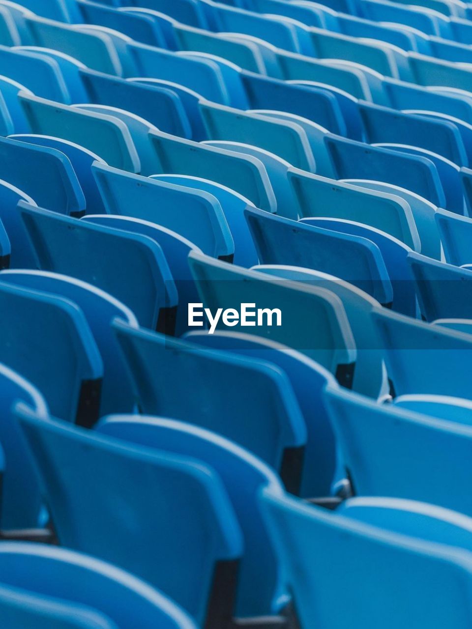 full frame shot of empty seats in stadium