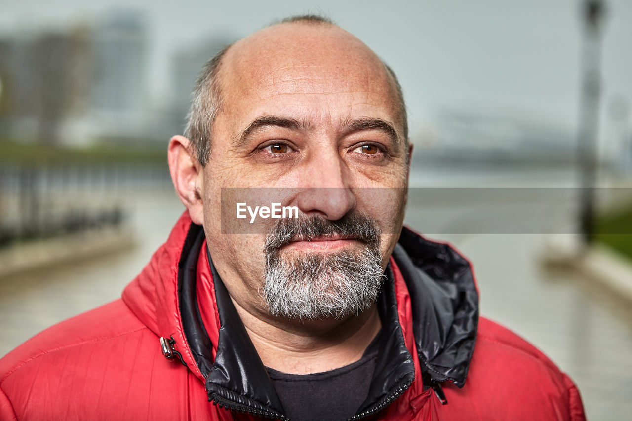 Man looking away outdoors