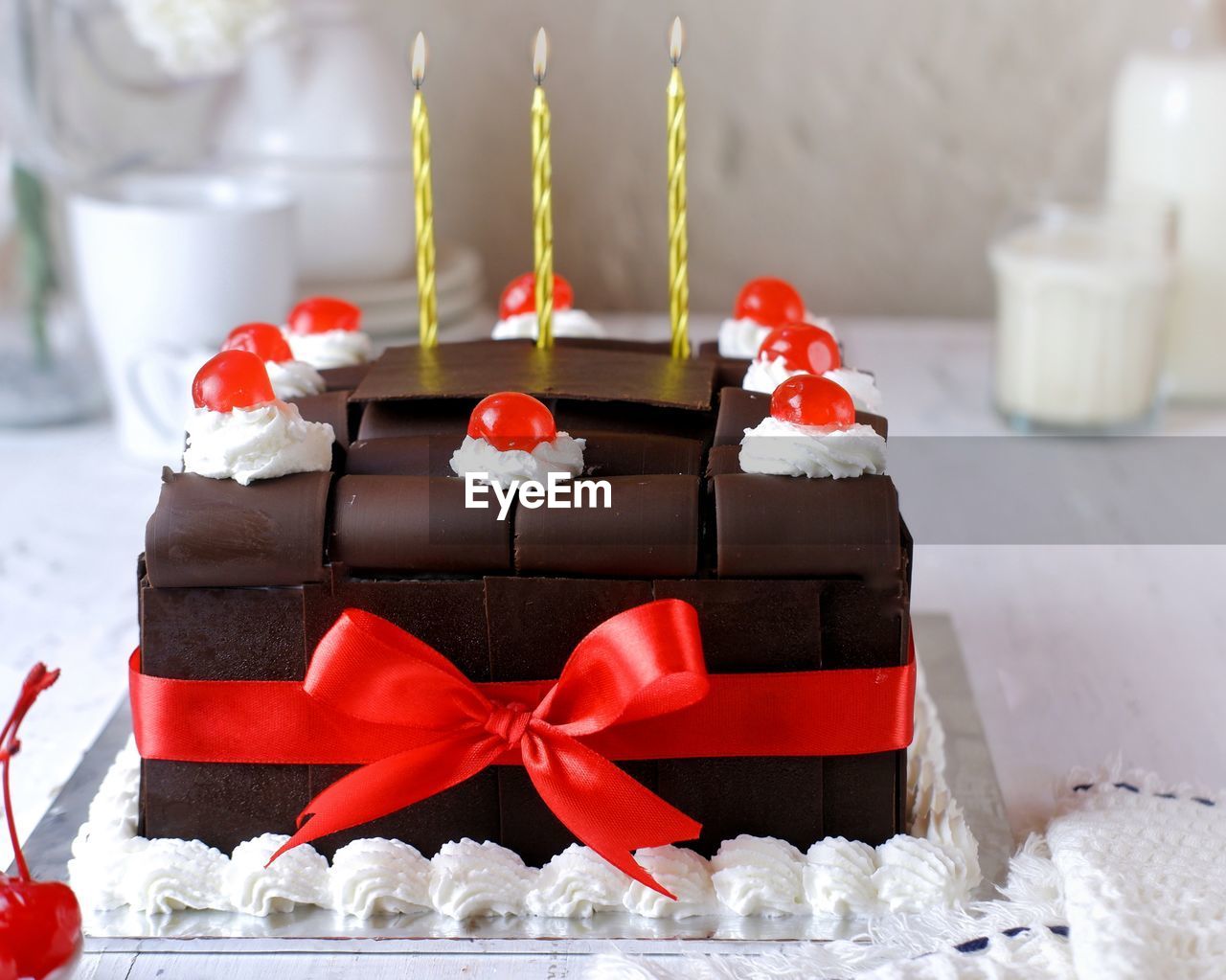  close-up of chocolate cakes on table, blackforest cake on a white background