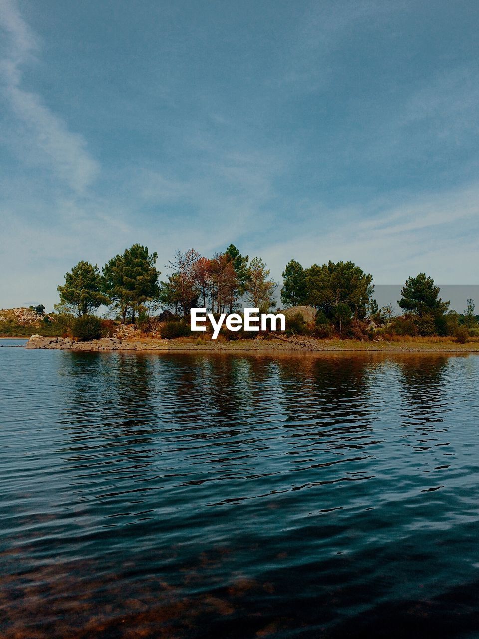 VIEW OF CALM SEA AGAINST SKY