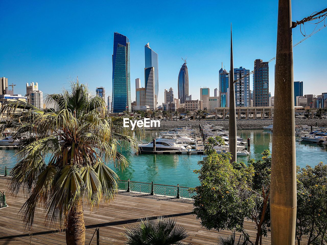 Panoramic view of city buildings against clear sky