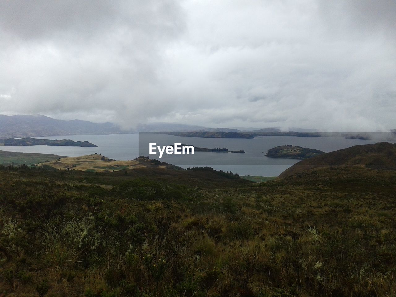 VIEW OF SEA AGAINST CLOUDY SKY