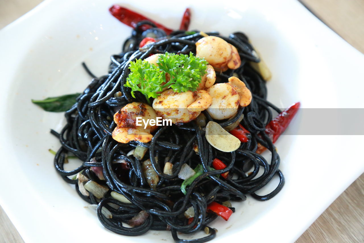 Close-up of spaghetti negra served in bowl
