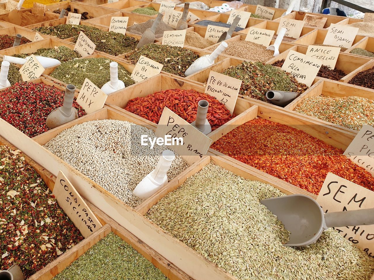 HIGH ANGLE VIEW OF SPICES FOR SALE IN MARKET