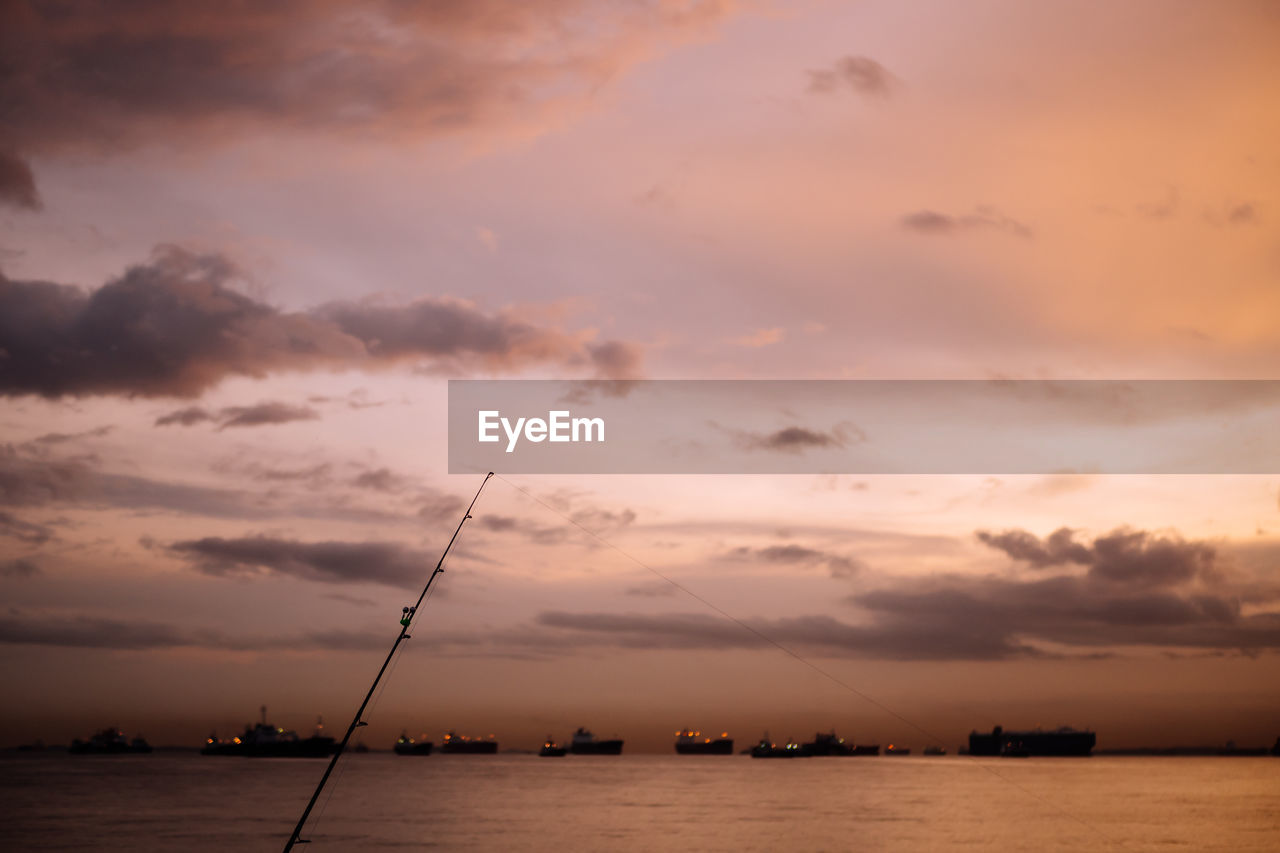 SCENIC VIEW OF SEA DURING SUNSET