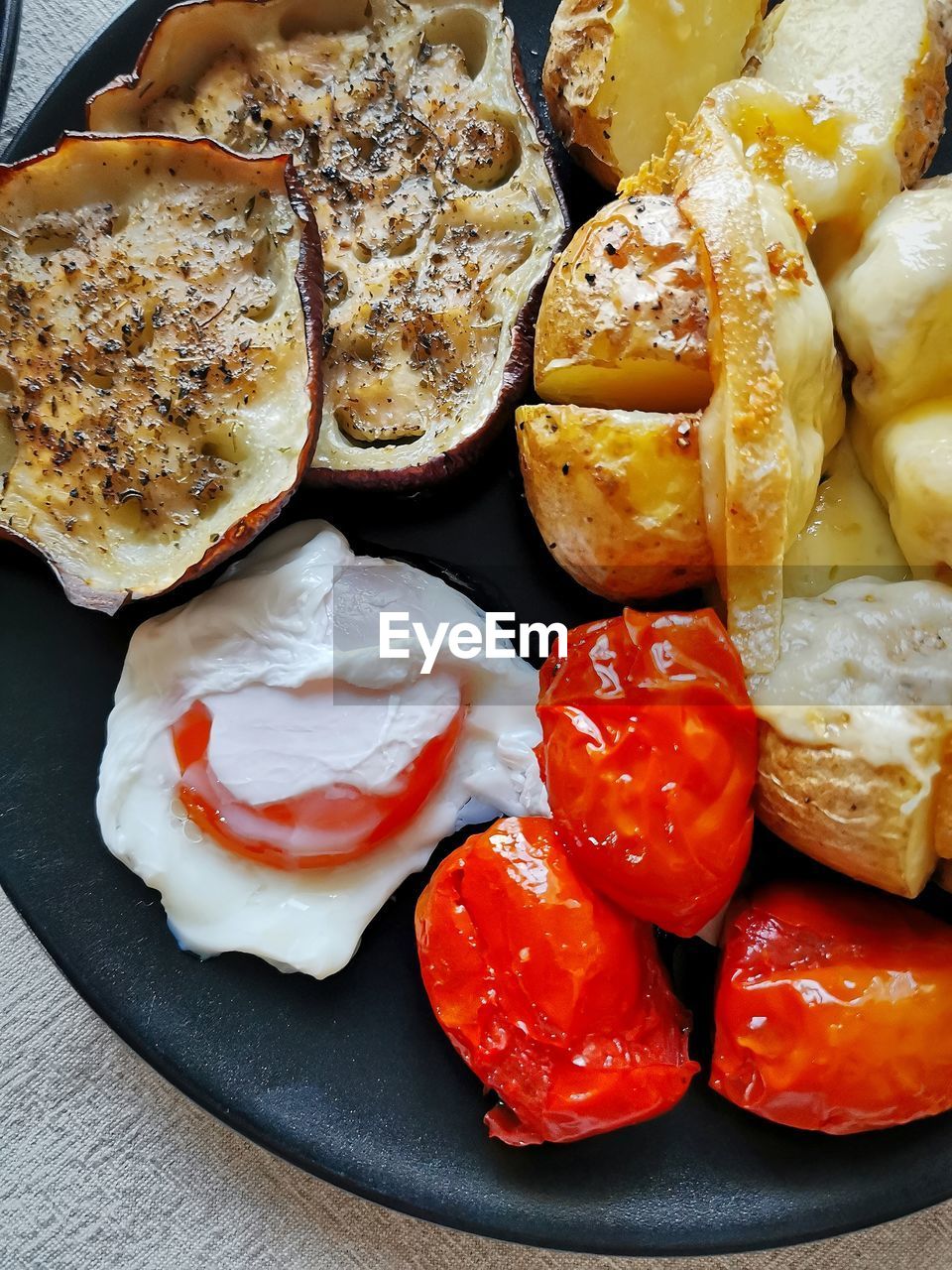 food, food and drink, dish, freshness, meal, breakfast, fast food, healthy eating, cuisine, no people, still life, indoors, produce, high angle view, wellbeing, plate, fruit, baked, vegetable, close-up, tomato, table
