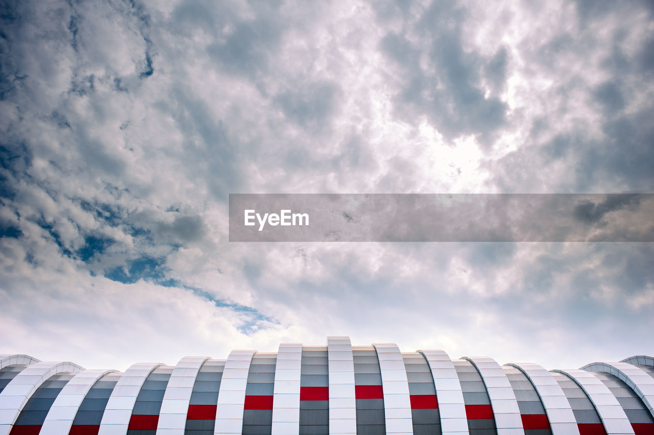 Roof of putra heights station against cloudy sky