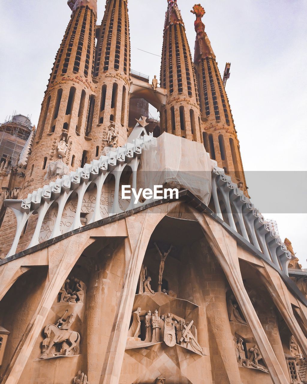 Low angle view of sagrada familia against sky
