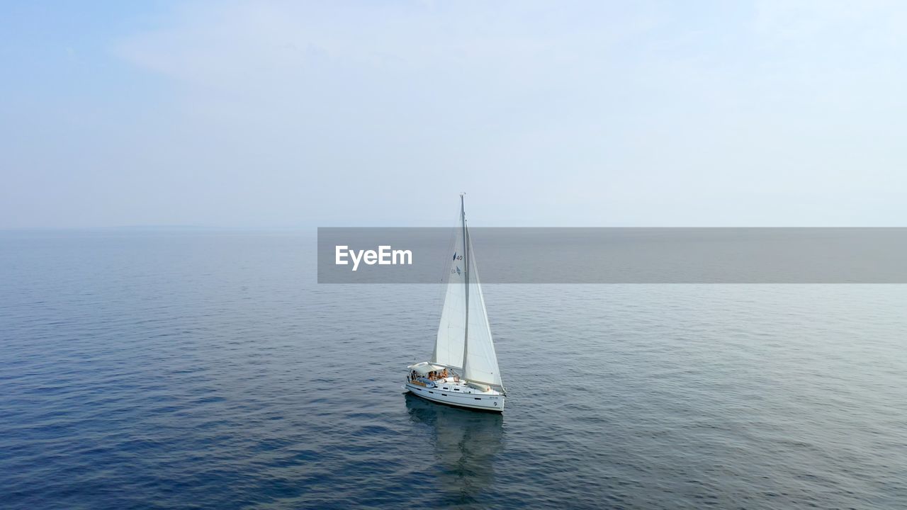 Sailing yacht in the sea. beautiful aerial drone shot.