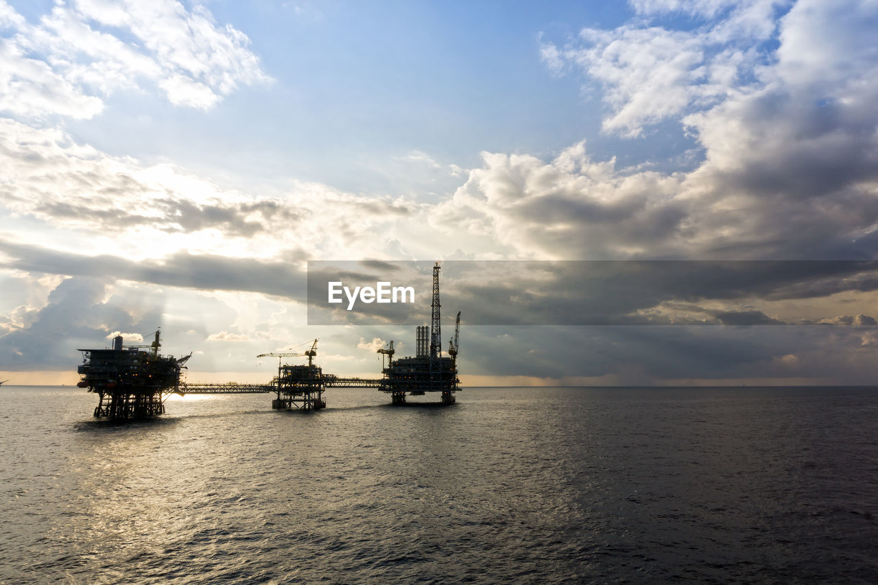 Seascape of silhouette oil production platform at offshore terengganu oil field